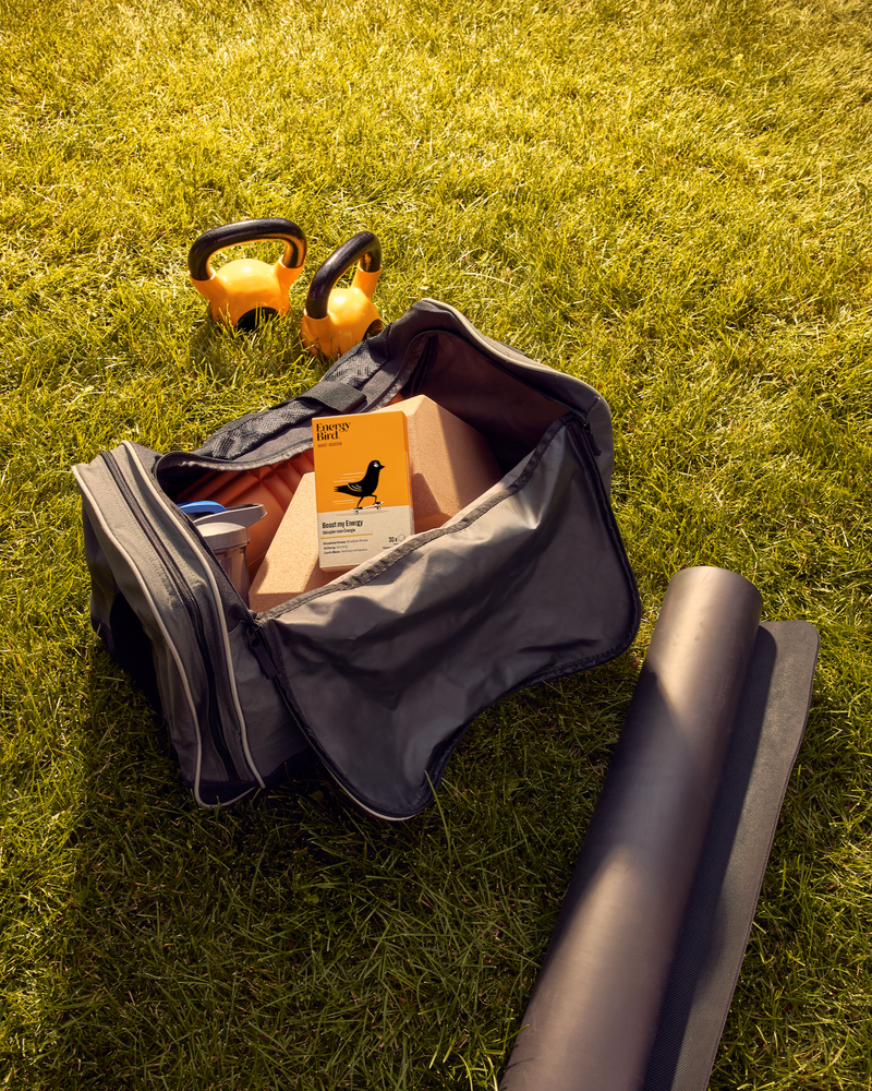 Energy Bird's Boost my Energy in a gym bag beside workout gear
