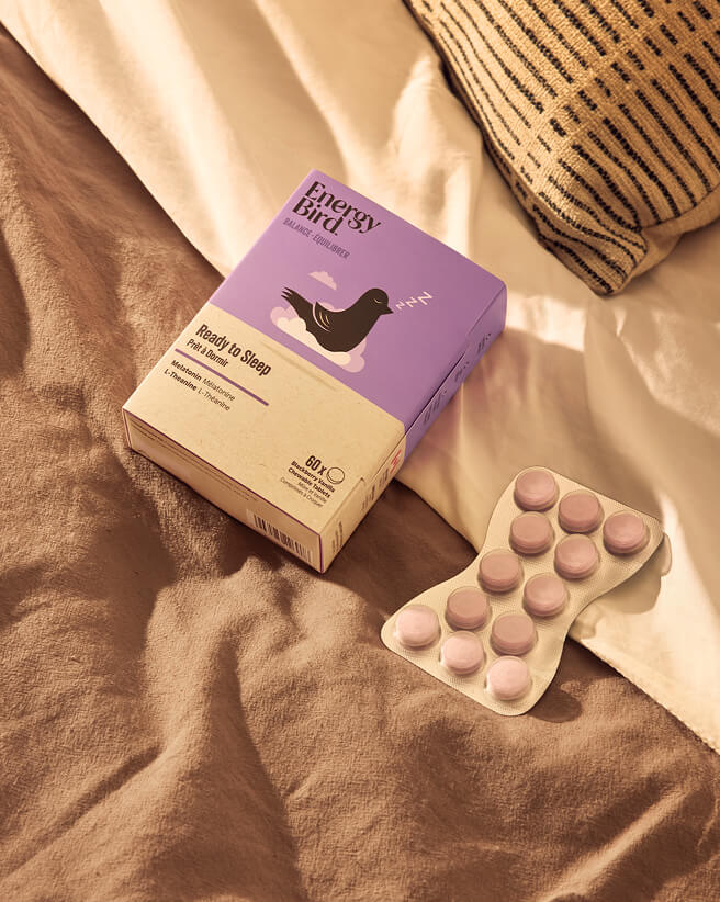 Energy Bird's Ready to Sleep package and blister pack on a brown bed